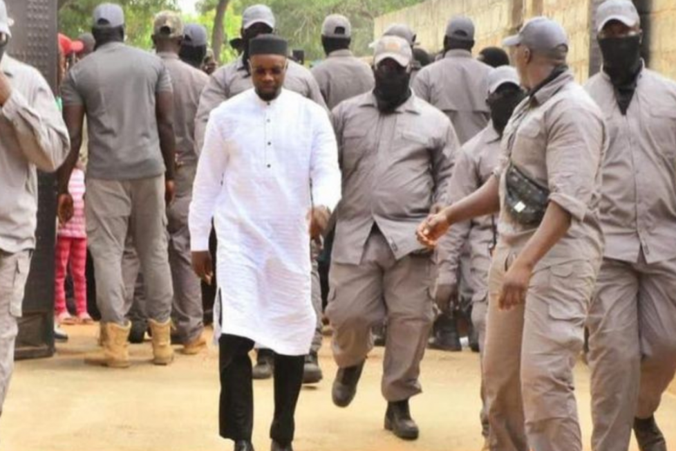 Politician Ousmane Sonko and his security detail